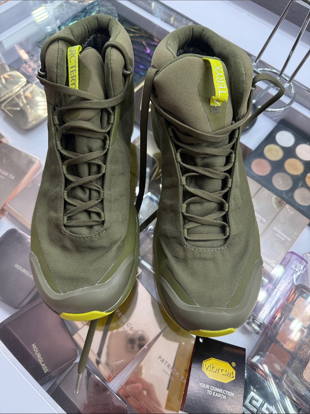 Arc'teryx Olive Green High-Top Hiking Boots with Yellow Accents